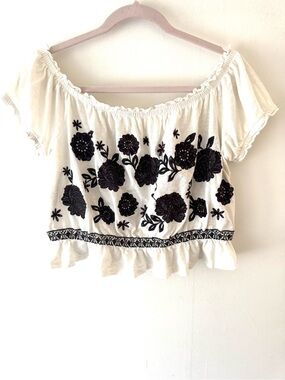 American Eagle Off-Shoulder White Crop Top with Black Floral Embroidery